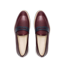 Load image into Gallery viewer, Overhead image of the loafers displaying the fine grain texture of the burgundy leather and the navy penny keeper strap.