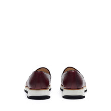Load image into Gallery viewer, Back angle of the loafers highlighting the dark heel counter and the gentle slope of the shoe's back, all above a sturdy chunky sole.