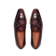 Load image into Gallery viewer, Top-down image of dark brown kiltie loafers, emphasizing the painted crocodile texture and neat lacing, against a pristine white surface.