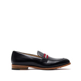 Side profile of a chic black calf leather loafer featuring a web stripe accent and a natural leather sole, presented against a pure white backdrop.