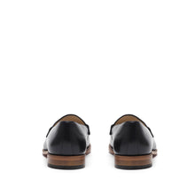 Load image into Gallery viewer, Back perspective of sophisticated black calf loafers, emphasizing the heel design and leather sole, set against a white background.
