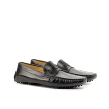 Load image into Gallery viewer, Front angle view of black nappa leather penny driving loafers with a classic penny strap, set on a white background showcasing the soft leather and precision stitching.
