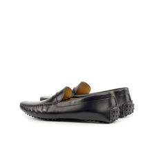 Load image into Gallery viewer, Side view of black nappa leather penny driving loafers with detailed stitching along the vamp and a distinctive penny keeper strap, presented on a white backdrop.
