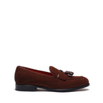 Side perspective of the brown suede loafers showing off the classic Kiltie tassel detail and sleek profile on a white background.