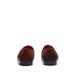 Back view of the suede loafers, focusing on the subtle heel and the smooth lines of the shoe's back on a white surface.