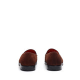 Back view of the suede loafers, focusing on the subtle heel and the smooth lines of the shoe's back on a white surface.
