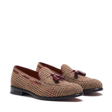 Load image into Gallery viewer, Front view of brown tweed tassel loafers on a white background, highlighting the classic tassel detail and textured fabric.
