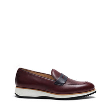 Load image into Gallery viewer, Side profile of the rich burgundy leather loafers showcasing the penny slot, with a clean white midsole and a black outsole.
