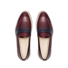 Load image into Gallery viewer, Overhead image of the loafers displaying the fine grain texture of the burgundy leather and the navy penny keeper strap.
