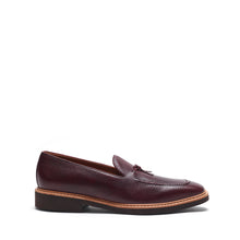 Load image into Gallery viewer, Side profile of the burgundy pebble grain loafers showing the textured leather and slim silhouette, set on a white backdrop.
