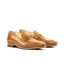 Load image into Gallery viewer, Elegant cognac-colored shell cordovan penny loafers with a glossy finish and classic slip-on style, displayed on a white background.
