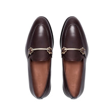 Load image into Gallery viewer, Top-down view of dark brown calf leather horsebit loafers, focusing on the symmetrical horsebit detailing and the exquisite stitching around the loafers&#39; periphery.
