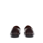 Back view of dark brown calf leather horsebit loafers, emphasizing the refined stitching details and the contrast of the rich brown leather against the sleek brown sole.
