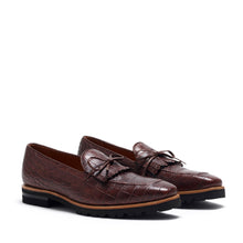 Load image into Gallery viewer, Front view of dark brown painted croco laced kiltie loafers showcasing the intricate texture and detailed bow-tie lacing on a white background.
