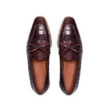Load image into Gallery viewer, Top-down image of dark brown kiltie loafers, emphasizing the painted crocodile texture and neat lacing, against a pristine white surface.
