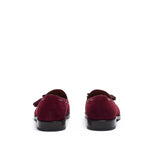 Rear view of wine suede laced tassel loafers, focusing on the smooth back counter and the subtle contrast of the brown sole edge.