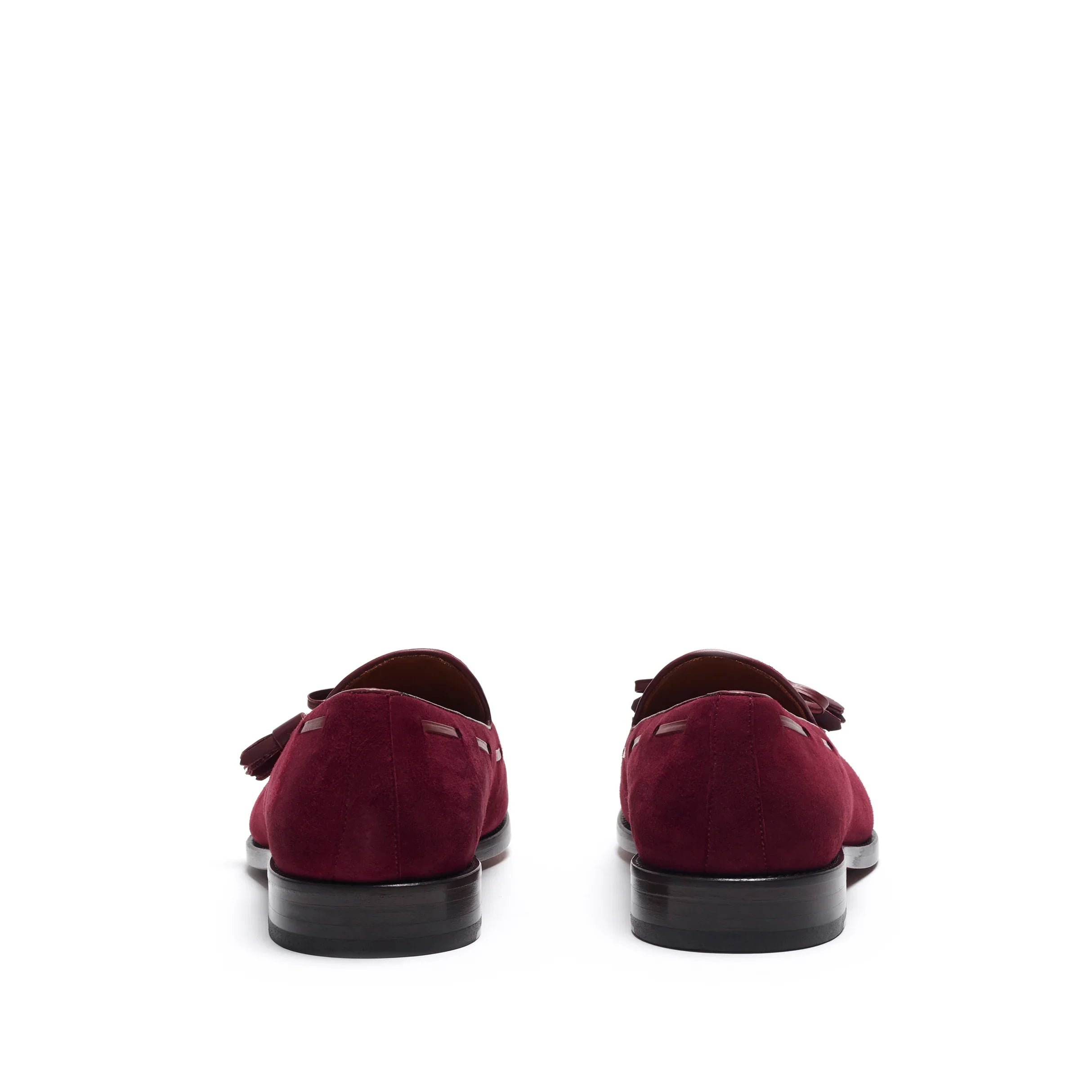 Rear view of wine suede laced tassel loafers, focusing on the smooth back counter and the subtle contrast of the brown sole edge.