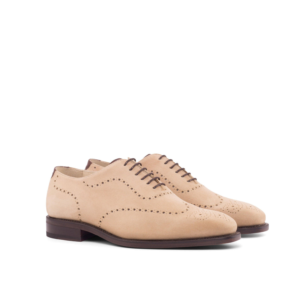 An ADORSI Beige Suede Wholecut Shoe with a brown sole.