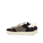 An ADORSI Black & White Houndstooth Low-Top Sneaker.